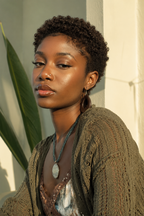 Woman with thick, shiny curls